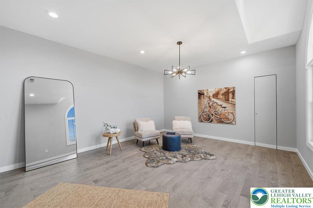 901 Meyer Road Nazareth, PA 18064 - Photo 46 of 80 a view of a dining room and hall with a dining table