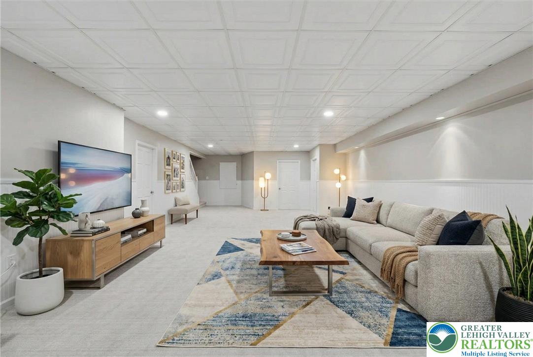 901 Meyer Road Nazareth, PA 18064 - Photo 55 of 80 a living room with furniture potted plant and a flat screen tv