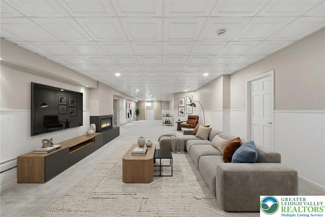 901 Meyer Road Nazareth, PA 18064 - Photo 57 of 80 a living room with furniture and a flat screen tv