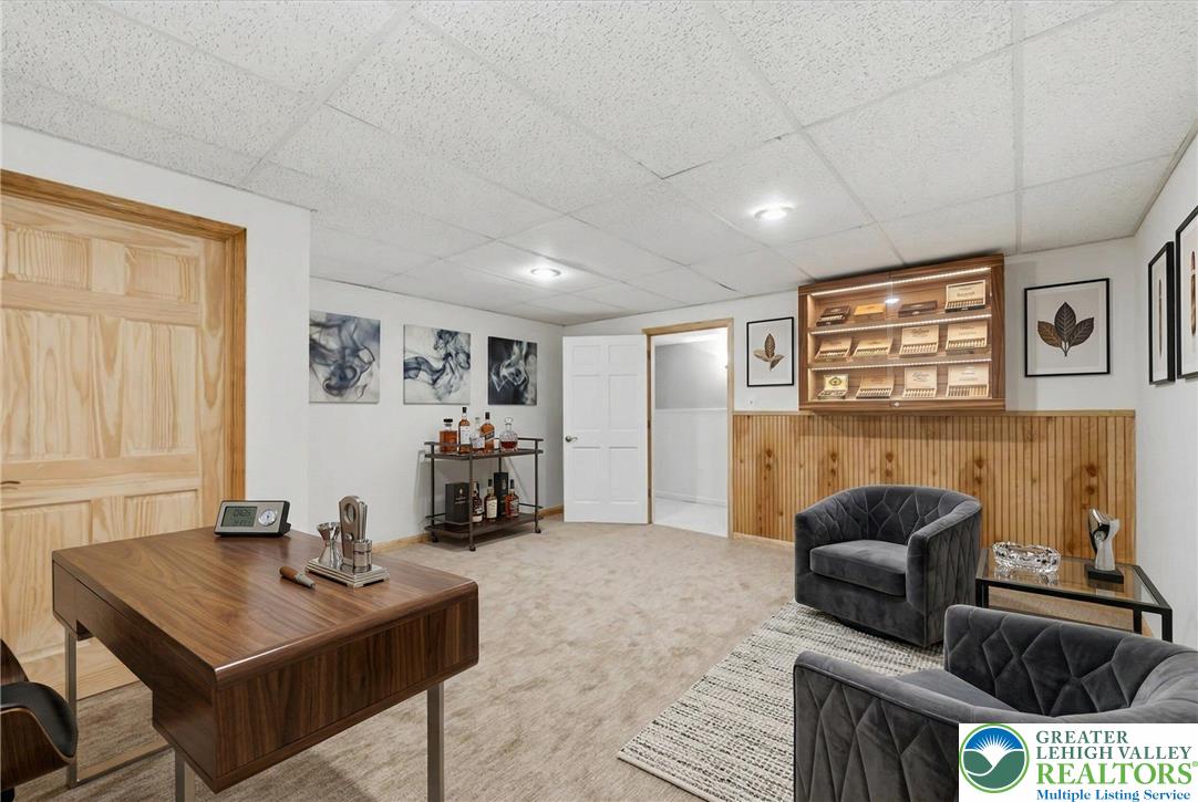 901 Meyer Road Nazareth, PA 18064 - Photo 63 of 80 a living room with furniture and a flat screen tv