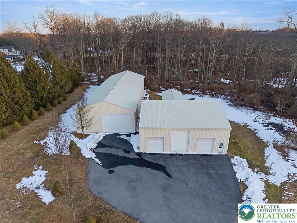 901 Meyer Road Nazareth, PA 18064 - Photo 72 of 80 a aerial view of a house with a yard and covered with trees