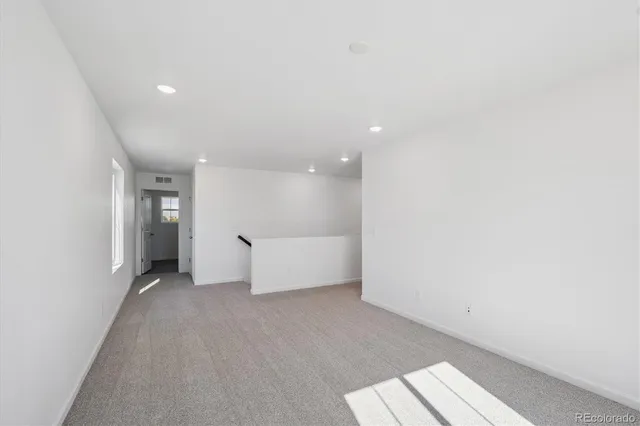 an empty room with a bathroom