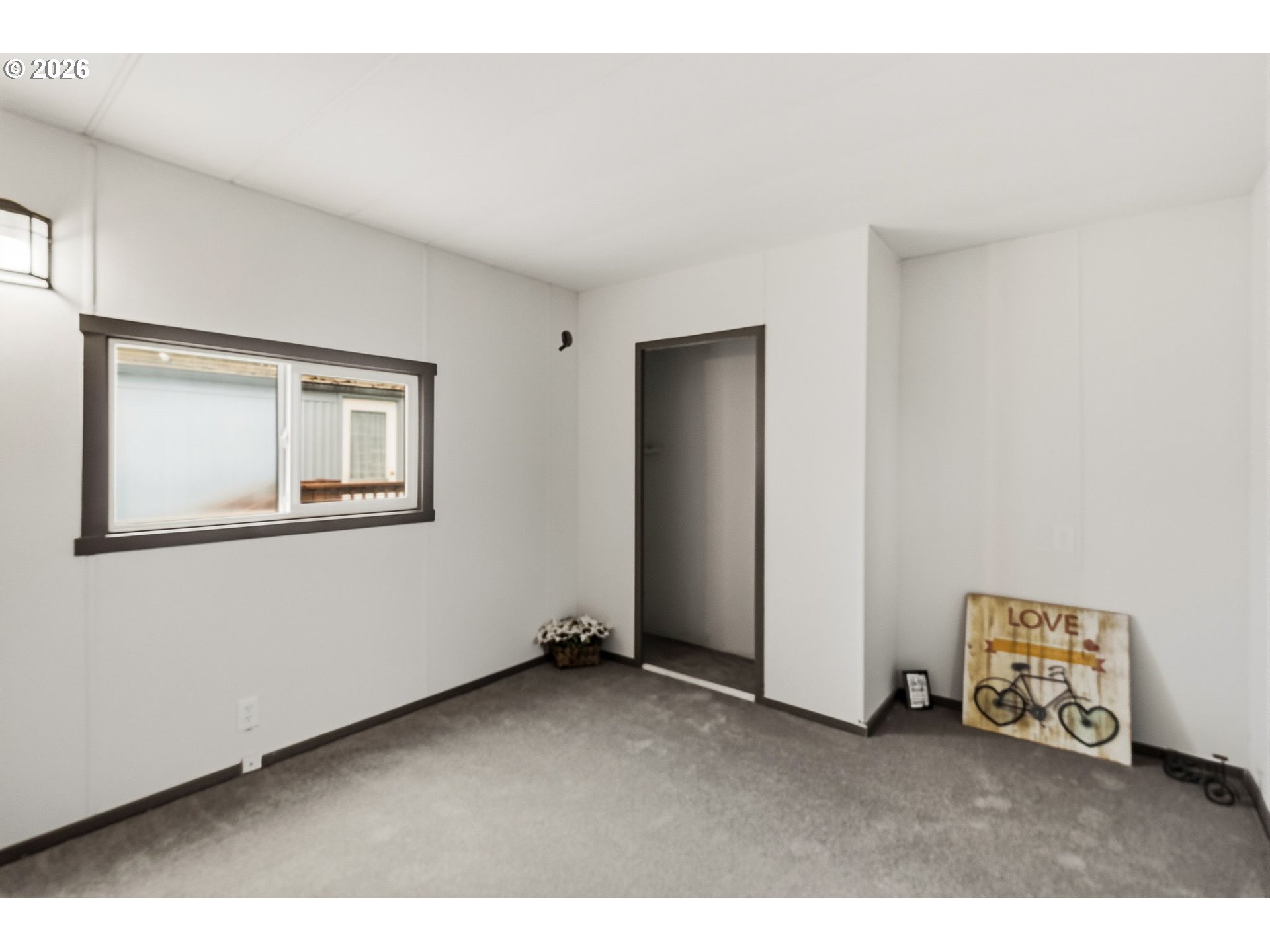 205 South 54th Street, Unit 76 Springfield, OR 97478 - Photo 19 of 41 a view of an empty room with windows