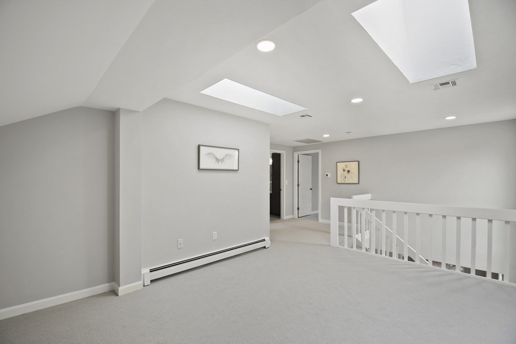 307 Ridgefield Circle, Unit D Clinton, MA 01510 - Photo 22 of 42 a view of a hallway with closet area