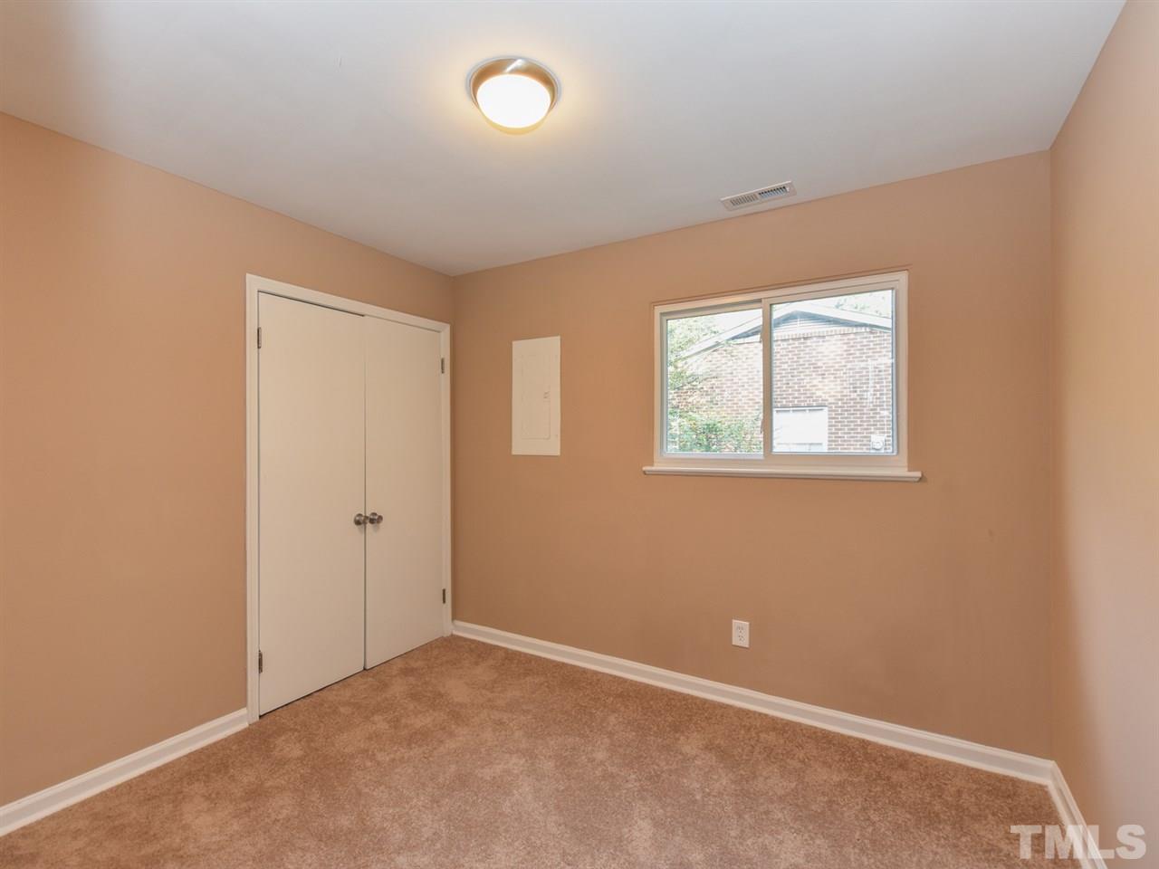 1221 Seabrook Road Raleigh, NC 27610 - Photo 12 of 16 an empty room with windows