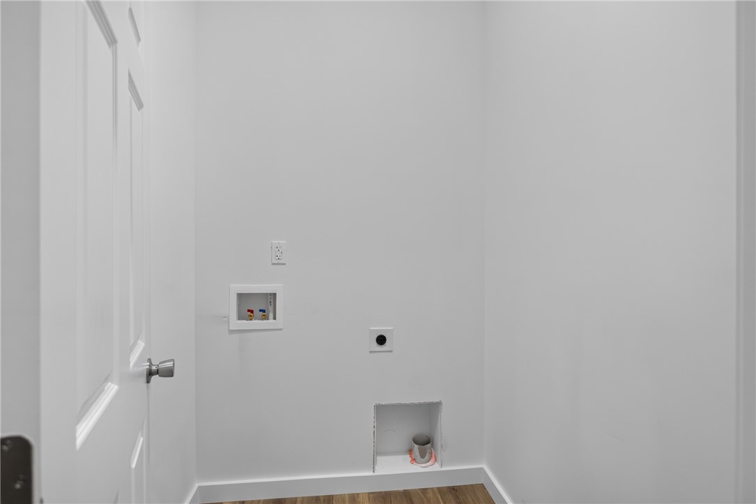 223 Maple Drive Anderson, SC 29621 - Photo 23 of 45 A dedicated utility space with hookups ready for essential laundry appliances.