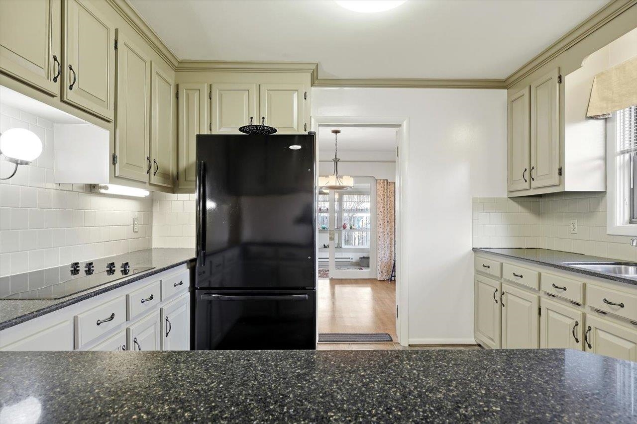 1133 Club Road Waynesboro, VA 22980 - Photo 16 of 58 a kitchen with stainless steel appliances granite countertop a refrigerator and a stove