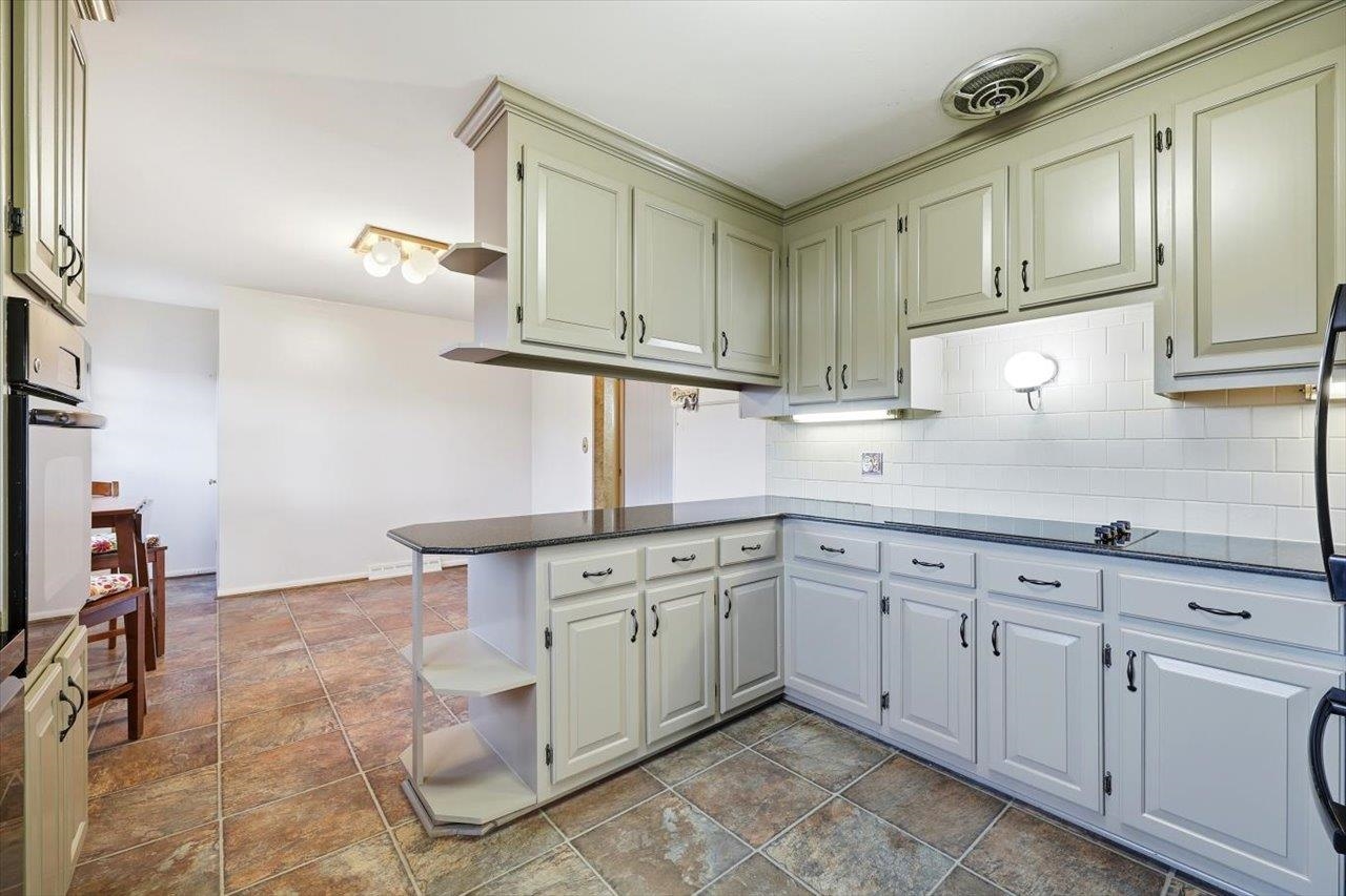 1133 Club Road Waynesboro, VA 22980 - Photo 19 of 58 a kitchen with cabinets a sink and appliances