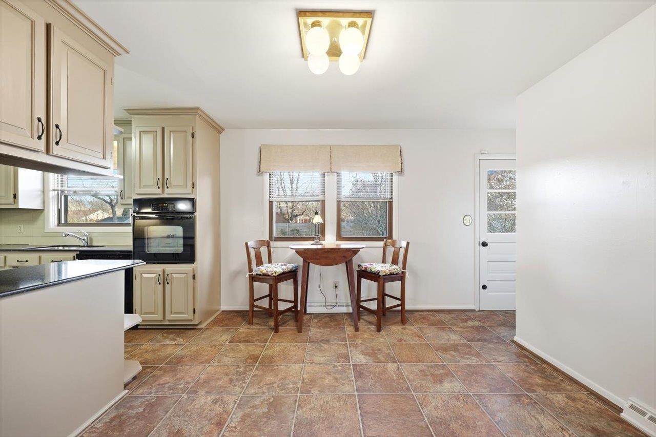 1133 Club Road Waynesboro, VA 22980 - Photo 20 of 58 a view of a kitchen with furniture and windows