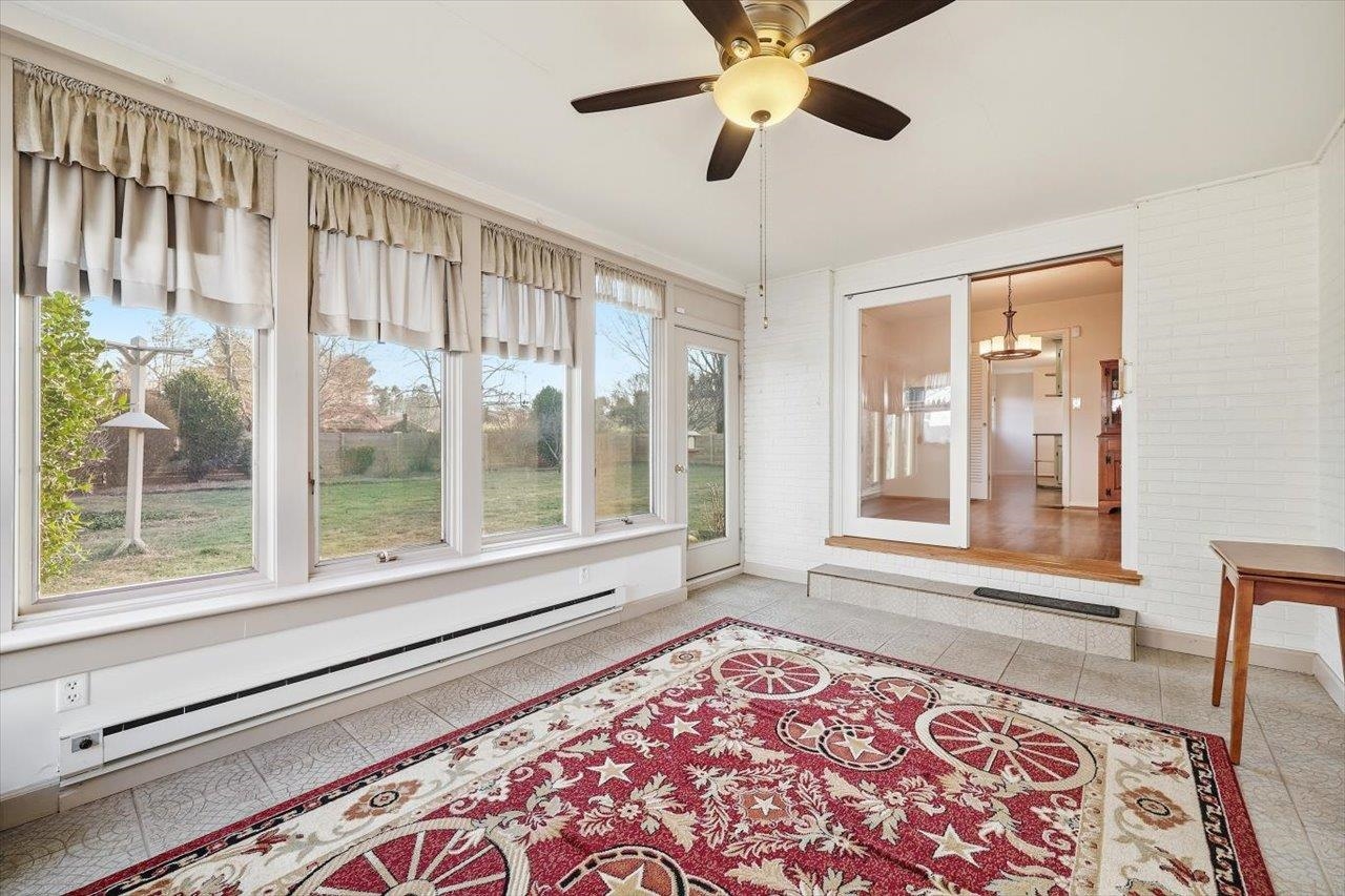 1133 Club Road Waynesboro, VA 22980 - Photo 28 of 58 a view of an empty room with wooden floor and a window
