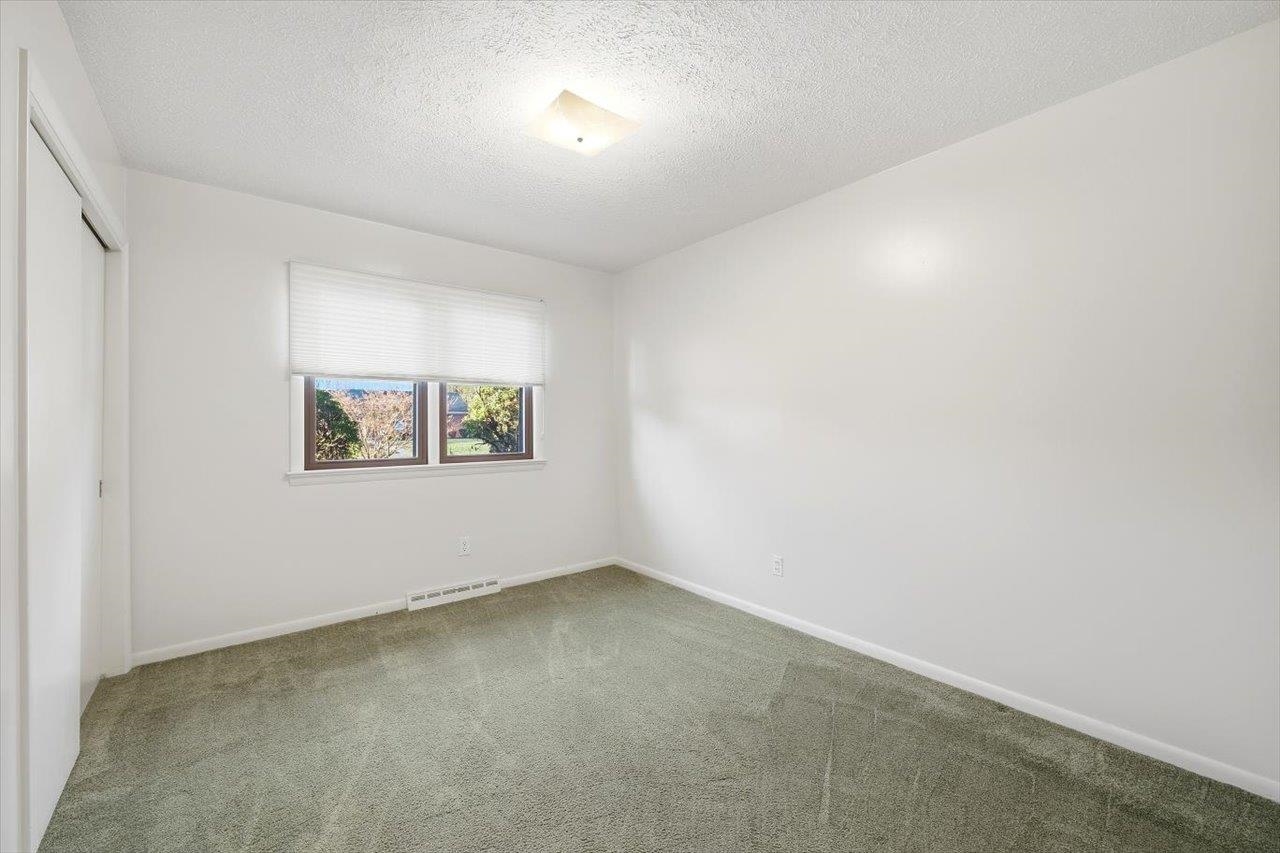 1133 Club Road Waynesboro, VA 22980 - Photo 37 of 58 an empty room with windows