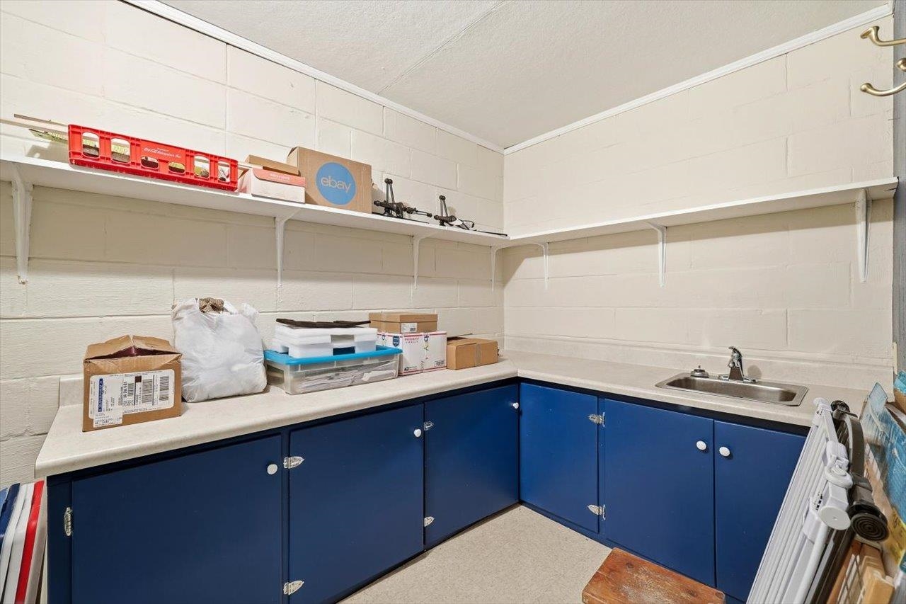 1133 Club Road Waynesboro, VA 22980 - Photo 46 of 58 a kitchen with a sink and cabinets