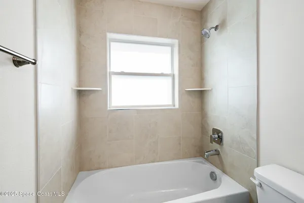 a bathroom with a bathtub