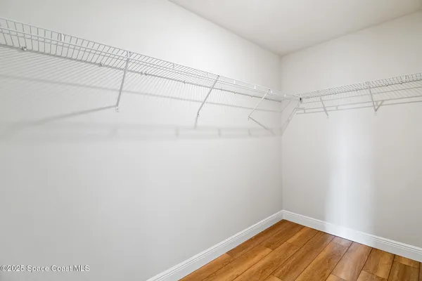 a view of a room with racks on the wall