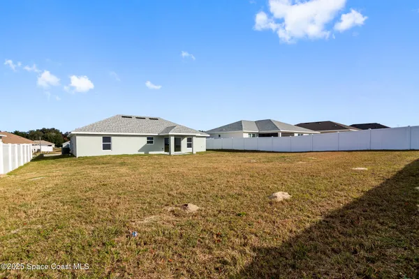 a front view of a house with a ocean view