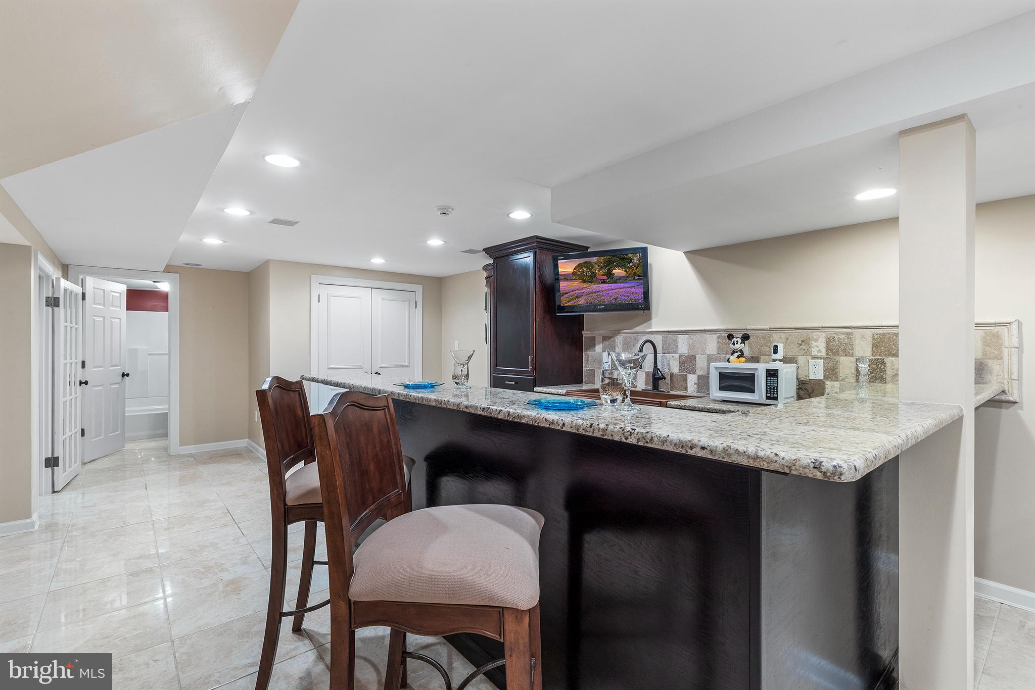 1240 Arrowmink Road Villanova, PA 19085 - Photo 25 of 42 Lower Level bar area