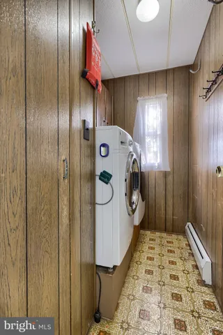 a small white house with a outdoor space