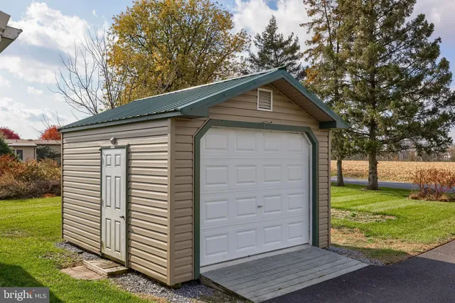 a house view with a backyard space
