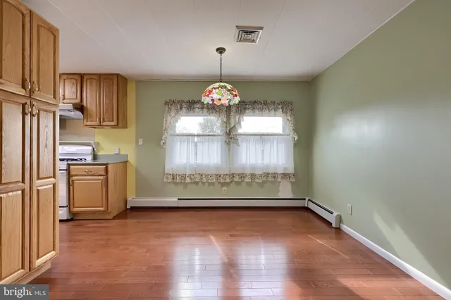a view of a storage & utility room with window