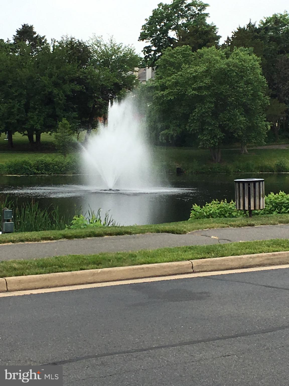 43506 Postrail Square Ashburn, VA 20147 - Photo 55 of 59 Lovely community pond with walking paths