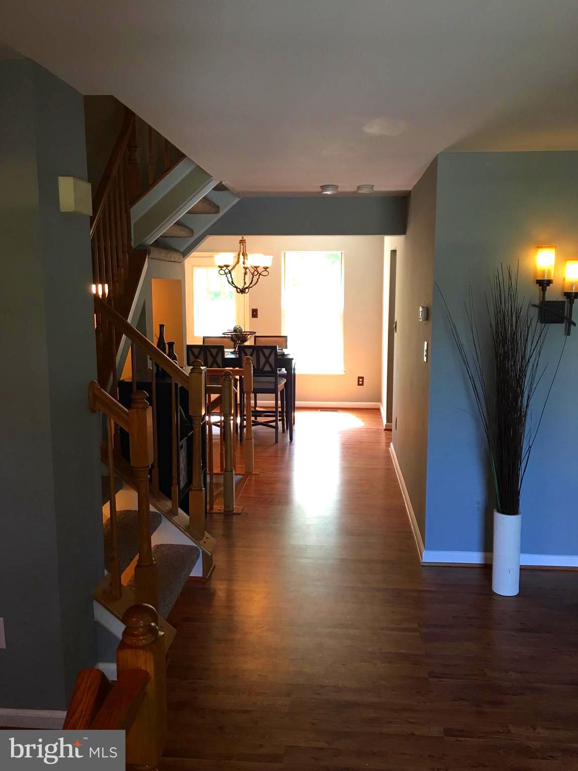 43506 Postrail Square Ashburn, VA 20147 - Photo 10 of 59 Living room flows to the dining room