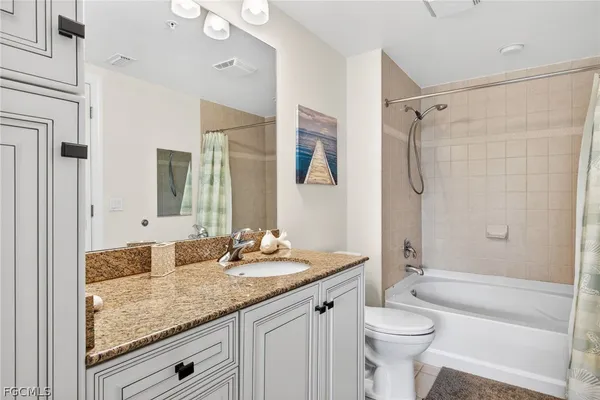 a view of a balcony with chairs