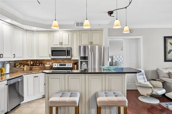 a view of a livingroom with furniture and a couch