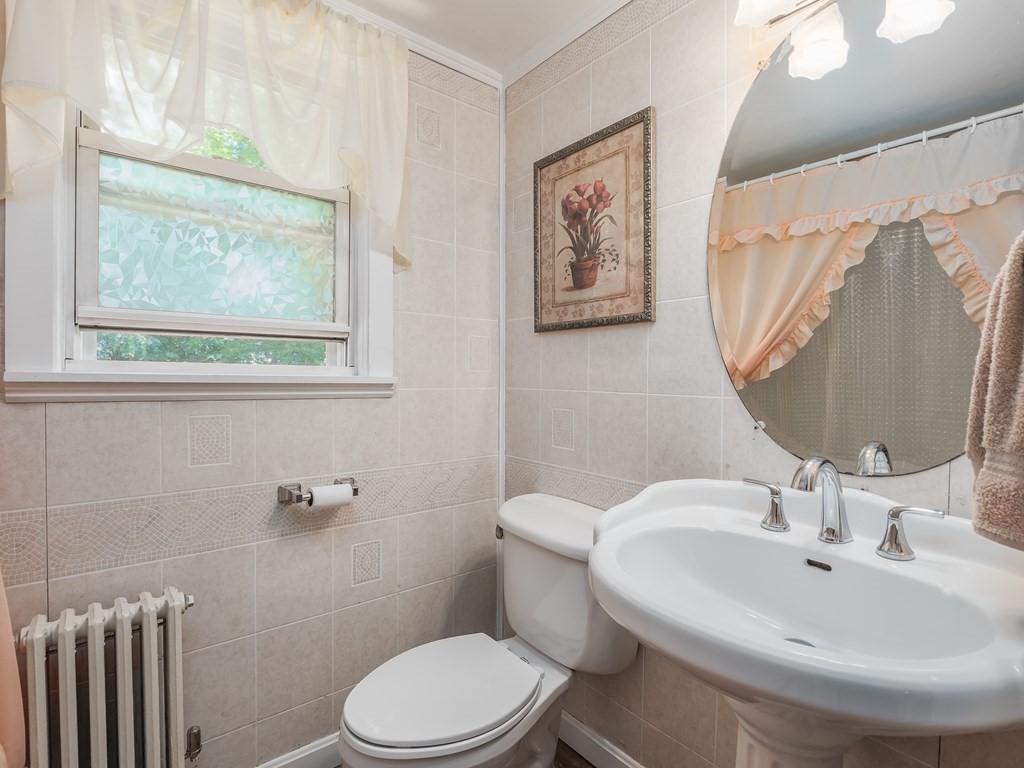 20 Rangeway Road Billerica, MA 01862 - Photo 17 of 41 a bathroom with a toilet a sink and mirror
