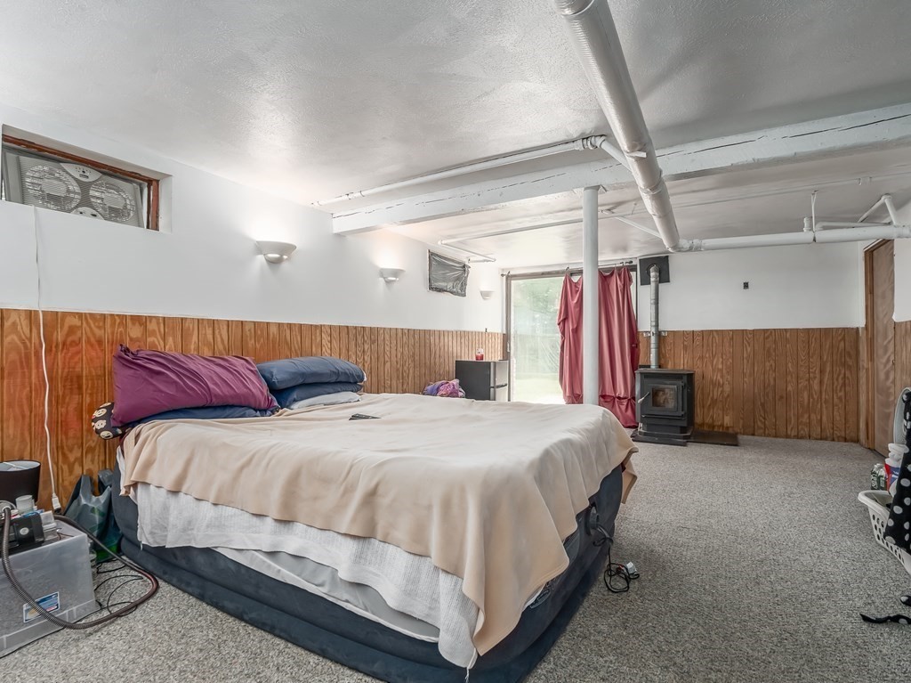 20 Rangeway Road Billerica, MA 01862 - Photo 24 of 41 a bedroom with a bed and a mirror