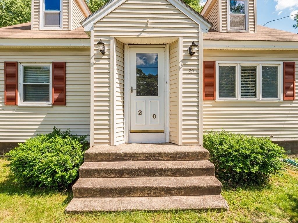 20 Rangeway Road Billerica, MA 01862 - Photo 3 of 41 a front view of a house with a garden