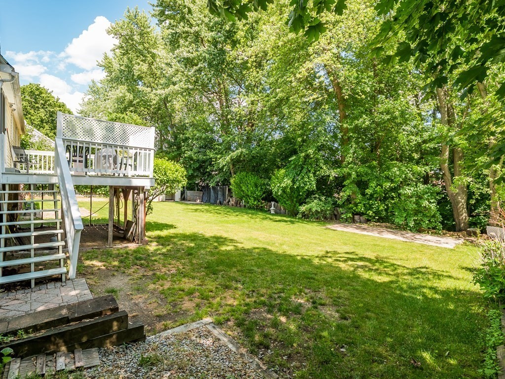 20 Rangeway Road Billerica, MA 01862 - Photo 36 of 41 a backyard of a house with yard and outdoor seating