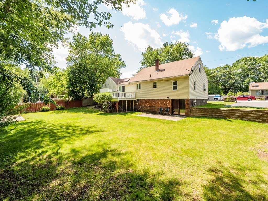 20 Rangeway Road Billerica, MA 01862 - Photo 4 of 41 a front view of a house with yard and swimming pool