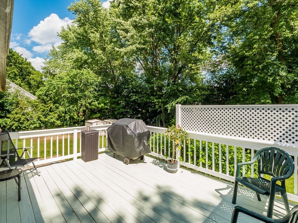 20 Rangeway Road Billerica, MA 01862 - Photo 5 of 41 a view of a wooden deck with a bench