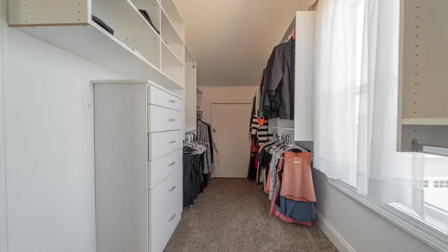 a bathroom with a sink a shower and a mirror