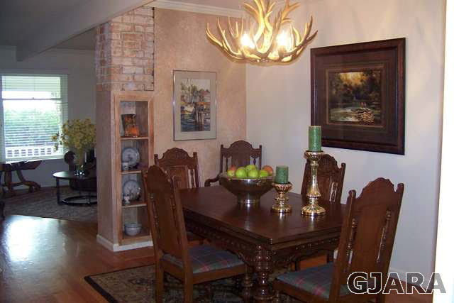 3530 G Road Palisade, CO 81526 - Photo 12 of 25 a view of a workspace with furniture and a window