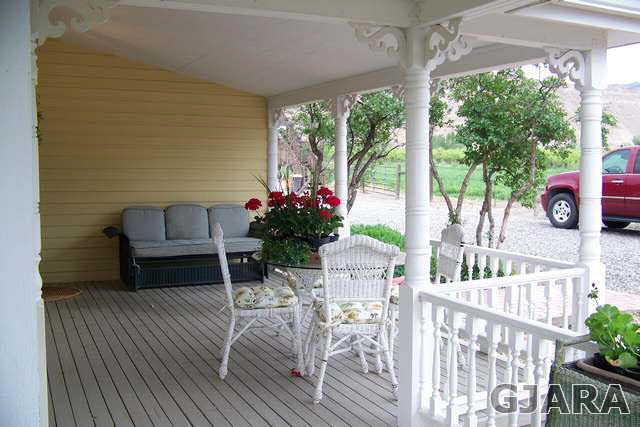 3530 G Road Palisade, CO 81526 - Photo 20 of 25 a view of a house with backyard and sitting area