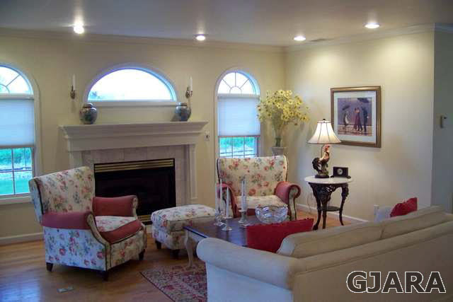 3530 G Road Palisade, CO 81526 - Photo 6 of 25 a living room with furniture and a fireplace