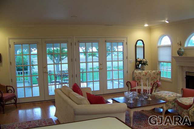 3530 G Road Palisade, CO 81526 - Photo 7 of 25 a living room with furniture and a large window