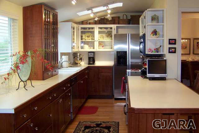 3530 G Road Palisade, CO 81526 - Photo 8 of 25 a kitchen with stainless steel appliances a sink stove and refrigerator