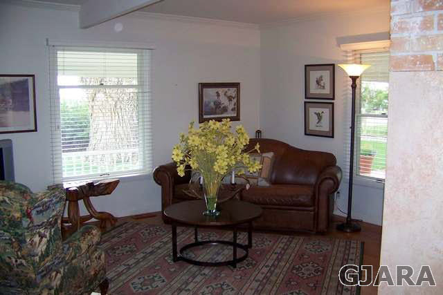 3530 G Road Palisade, CO 81526 - Photo 10 of 25 a living room with furniture and a window