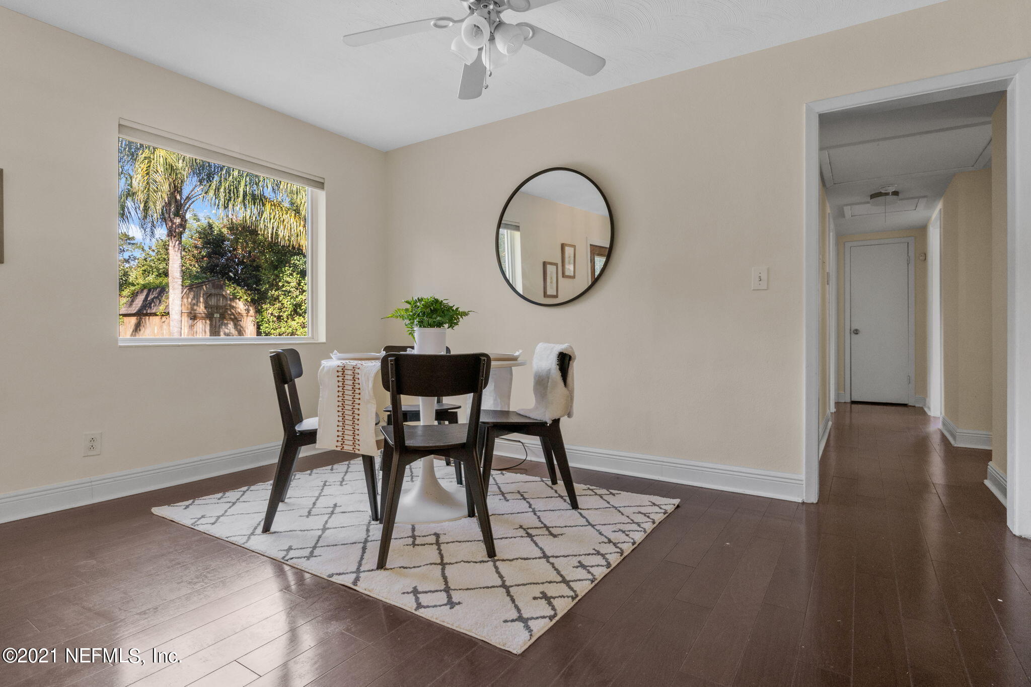 2428 Randy Road Jacksonville, FL 32216 - Photo 8 of 24 a view of a dining room with furniture window and wooden floor