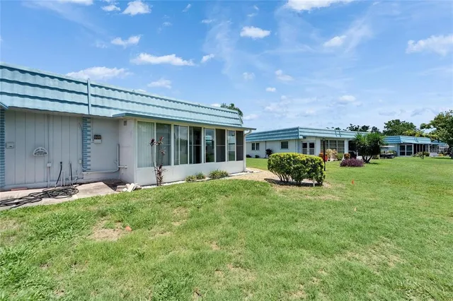 a house view with a garden space