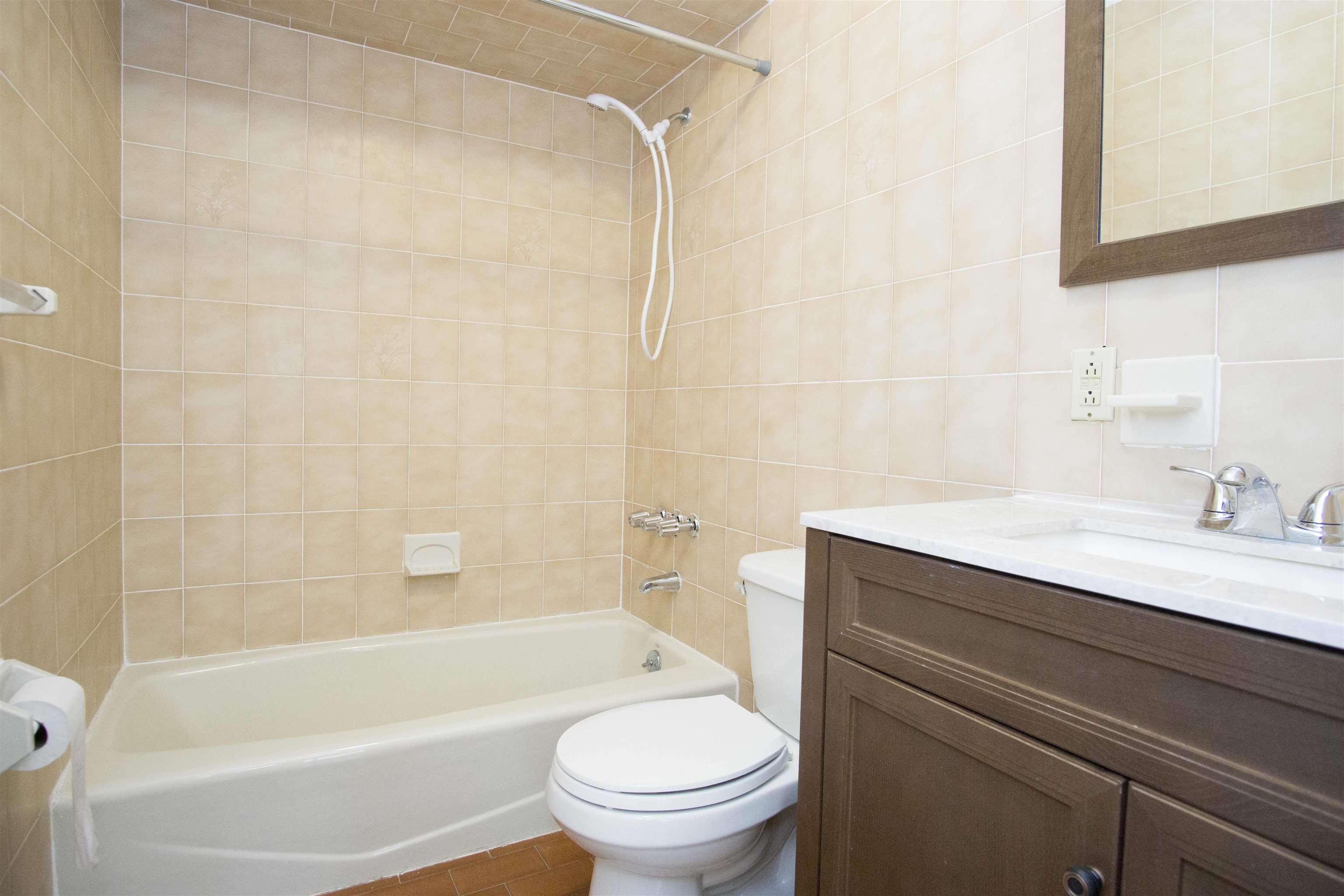 200 Central Avenue, Unit B5 Jersey City, NJ 07307 - Photo 8 of 12 a bathroom with a sink a toilet and a bathtub