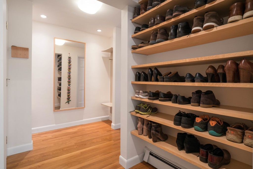51 Baskin Road Lexington, MA 02421 - Photo 23 of 28 a view of wooden floor and shelves