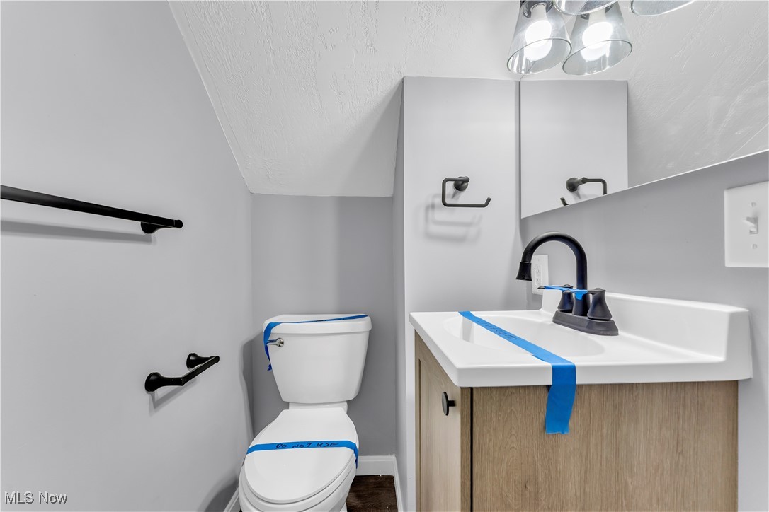 953 Whitby Road Cleveland Heights, OH 44112 - Photo 19 of 27 Half bathroom featuring vanity and toilet