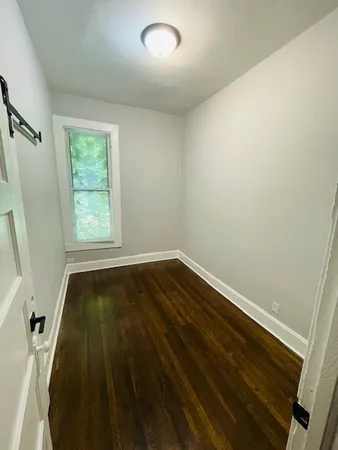 a view of an empty room and window
