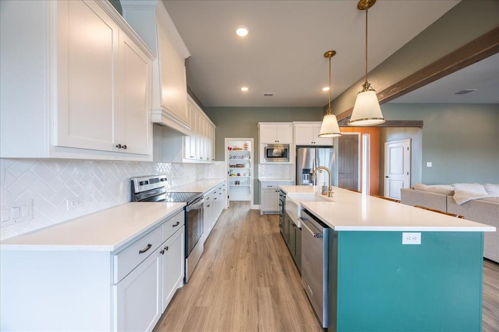 10251 Finch Road Sanger, TX 76266 - Photo 8 of 38 Plenty of cabinets