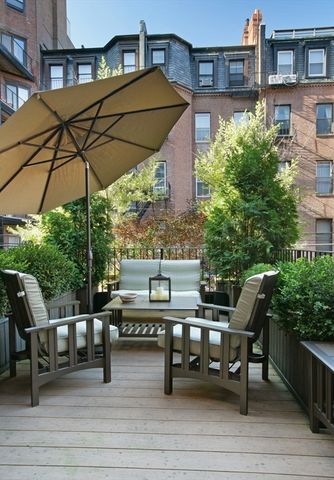 a view of a terrace with seating area