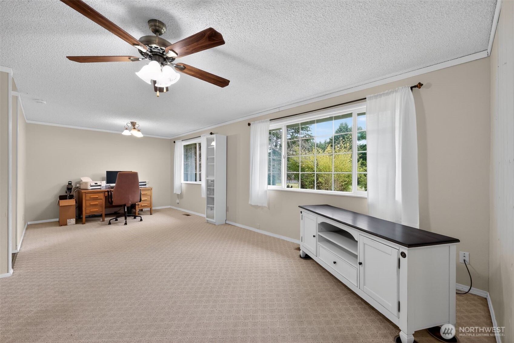 271 Hawkins Road Winlock, WA 98596 - Photo 12 of 26 a living room with furniture and ceiling fan