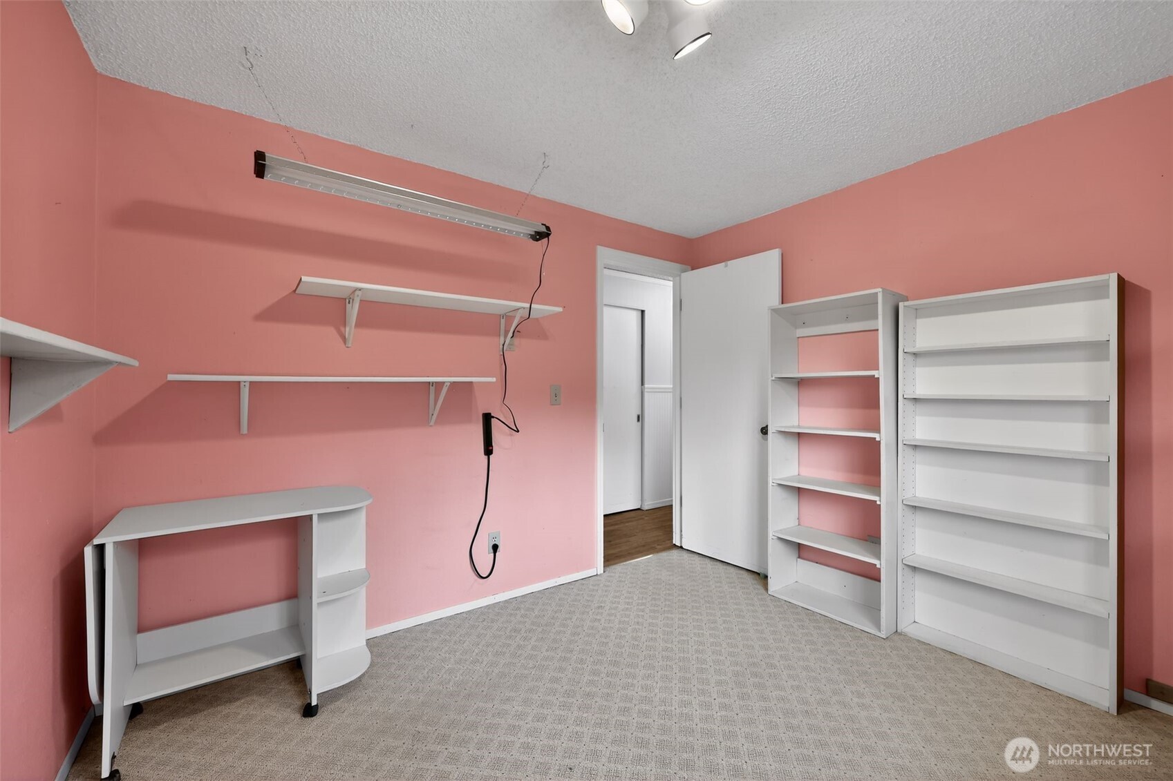 271 Hawkins Road Winlock, WA 98596 - Photo 18 of 26 a room with a furniture and a window